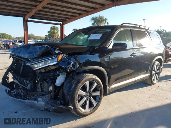 2024 Honda Pilot Elite with VIN 5FNYG1H85RB001707, listed as a IAAI auction lot 41793733 with 20,491 mi miles. Bid and sale history available at carsss.com. Image 22.