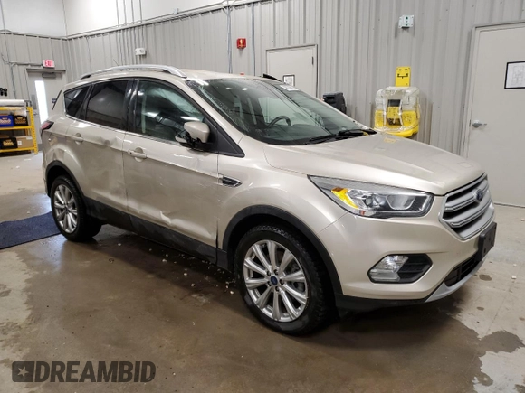 2017 Ford Escape Titanium with VIN 1FMCU9JD1HUC87663, listed as a Copart auction lot 48338605 with 83,768 mi miles and Salvage Title. Bid and sale history available at carsss.com. Image 4.