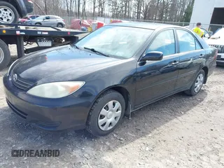 2004 Toyota Camry LE with VIN 4T1BE32K94U307994, listed as a IAAI auction lot 41847450 with 164,016 mi miles and . Bid and sale history available at carsss.com. Image 2.