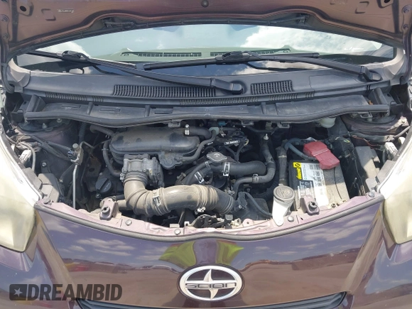 2012 Scion iQ with VIN JTNJJXB0XCJ021245, listed as a IAAI auction lot 42463167 with 158,901 mi miles and . Bid and sale history available at DreamBid. Image 10.