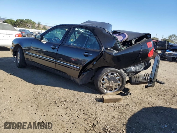1998 Mercedes-Benz E 320 with VIN WDBJF65F8WA591263, listed as a Copart auction lot 77790804 with 204,821 mi miles and Non Repairable. Bid and sale history available at DreamBid. Image 2.