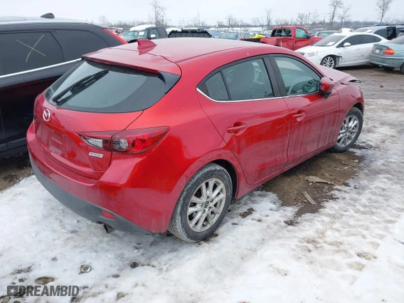 2016 Mazda Mazda3 i Grand Touring with VIN 3MZBM1N77GM245567, listed as a IAAI auction lot 41330883 with 128,423 mi miles. Bid and sale history available at carsss.com. Image 4.