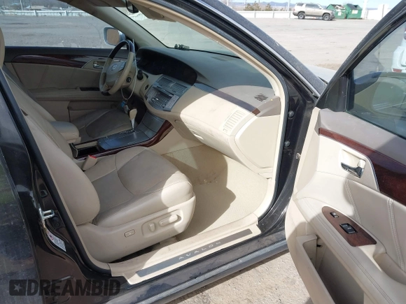 2009 Toyota Avalon XL with VIN 4T1BK36B59U325810, listed as a IAAI auction lot 41337809 with 184,476 mi miles. Bid and sale history available at carsss.com. Image 5.