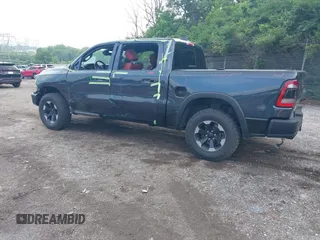 2019 Ram 1500 Rebel z VIN 1C6SRFLT1KN784936, wystawiony jako IAAI lot #42375986 z przebiegiem 78 539 mil mil oraz . Historia ofert i sprzedaży dostępna na DreamBid. Obrazek 3.