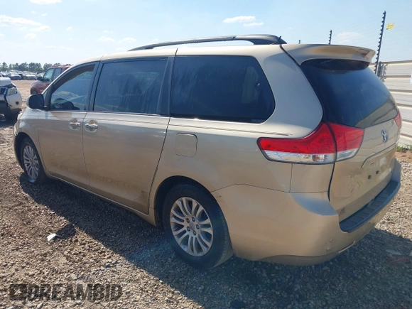 2011 Toyota Sienna XLE AAS with VIN 5TDYK3DC4BS013644, listed as a IAAI auction lot 41905759 with 208,800 mi miles and . Bid and sale history available at DreamBid. Image 3.