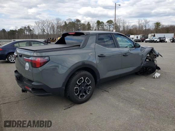 2022 Hyundai Santa Cruz SEL z VIN 5NTJBDAEXNH028481, wystawiony jako Copart lot #50438445 z przebiegiem Nie podano mil oraz Szkoda całkowita • Salvage title. Historia ofert i sprzedaży dostępna na DreamBid. Obrazek 3.