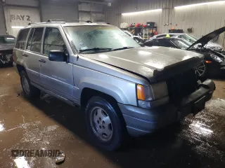 1997 Jeep Grand Cherokee Laredo with VIN 1J4GZ58Y7VC650813, listed as a Copart auction lot 41486724 with 266,004 mi miles and Salvage Title. Bid and sale history available at carsss.com. Image 4.