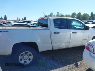 2021 Chevrolet Colorado 4WD Work Truck with VIN 1GCGTBEN0M1233723, listed as a IAAI auction lot 42600025 with 58,906 mi miles and . Bid and sale history available at DreamBid. Image 13.