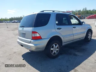 2004 Mercedes-Benz M 350 with VIN 4JGAB57E84A472827, listed as a IAAI auction lot 42135826 with 221,174 mi miles and . Bid and sale history available at DreamBid. Image 4.