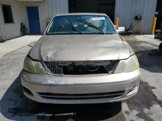2002 Toyota Avalon XL z VIN 4T1BF28B72U261478, wystawiony jako Copart lot #57638745 z przebiegiem 146 479 mil mil oraz Szkody całkowita. Historia ofert i sprzedaży dostępna na DreamBid. Obrazek 5.