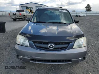 2001 Mazda Tribute LX with VIN 4F2CU08101KM29823, listed as a Copart auction lot 53857145 with 187,710 mi miles and Salvage Title. Bid and sale history available at carsss.com. Image 5.