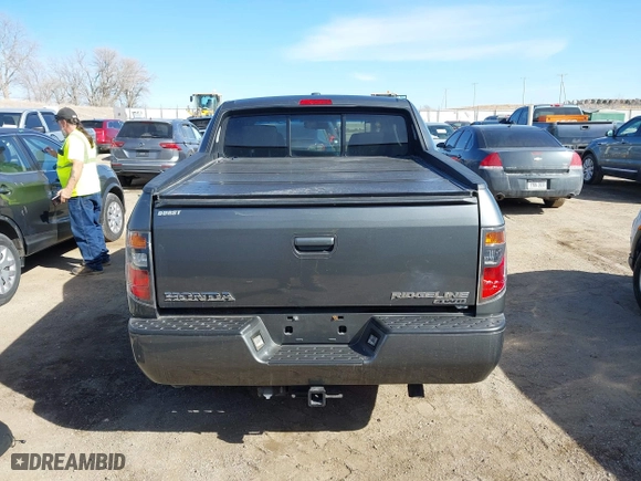 2008 Honda Ridgeline RTL with VIN 2HJYK16578H521578, listed as a IAAI auction lot 41672467 with 149,627 mi miles. Bid and sale history available at carsss.com. Image 16.