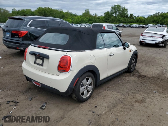 2019 MINI Convertible Cooper с VIN WMWWG5C57K3D01554, выставлен на аукционе Copart как лот 57497795 с пробегом 98 158 миль миль и Списание • Salvage title. История ставок и продаж доступна на DreamBid. Изображение 3.