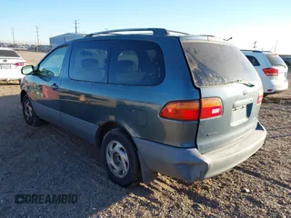 2000 Toyota Sienna CE with VIN 4T3GF19C2YU240254, listed as a IAAI auction lot 40688669 with 1 mi miles. Bid and sale history available at carsss.com. Image 3.