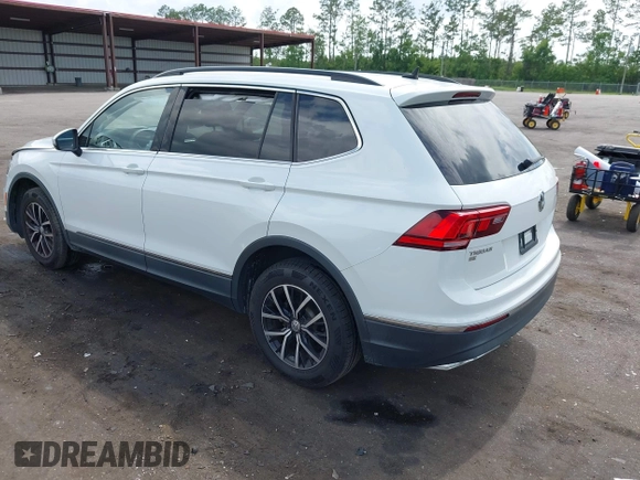 2021 Volkswagen Tiguan SE z VIN 3VV2B7AX5MM057743, wystawiony jako IAAI lot #42471192 z przebiegiem 80 133 mil mil oraz . Historia ofert i sprzedaży dostępna na DreamBid. Obrazek 3.