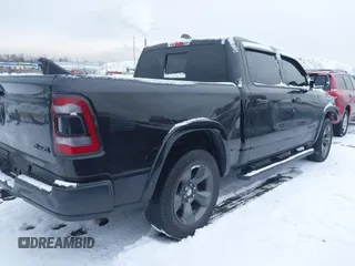 2020 Ram 1500 Big Horn z VIN 1C6RRFFG7LN285301, wystawiony jako IAAI lot #41241988 z przebiegiem 89 567 mil mil oraz . Historia ofert i sprzedaży dostępna na DreamBid. Obrazek 4.