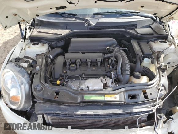 2010 MINI Convertible S with VIN WMWMS3C51ATZ85166, listed as a Copart auction lot 52907775 with 90,090 mi miles and Salvage title. Bid and sale history available at DreamBid. Image 12.