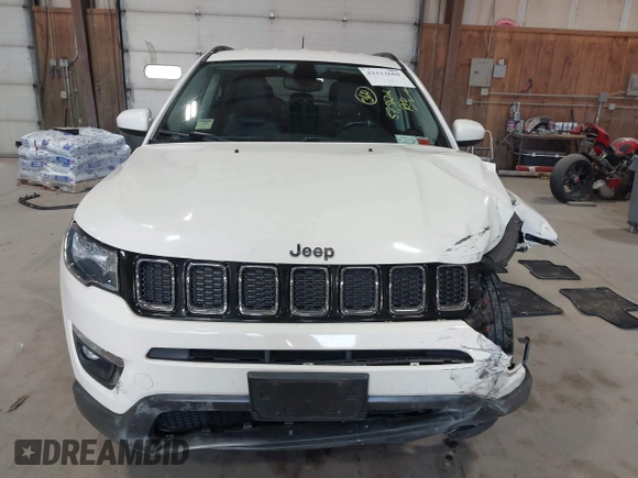 2020 Jeep Compass Latitude z VIN 3C4NJDBB4LT132288, wystawiony jako IAAI lot #42113669 z przebiegiem 57 312 mil mil oraz . Historia ofert i sprzedaży dostępna na DreamBid. Obrazek 12.