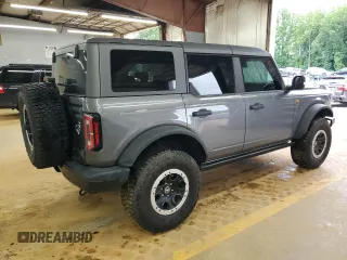 2021 Ford Bronco с VIN 1FMEE5DP9MLB06877, выставлен на аукционе Copart как лот 57254245 с пробегом 47 410 миль миль и Списание • Salvage title. История ставок и продаж доступна на DreamBid. Изображение 3.