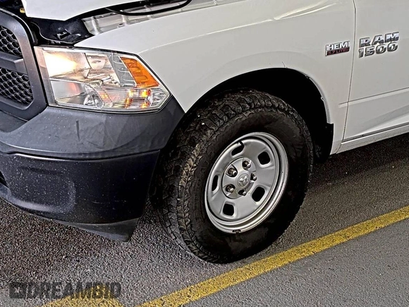 2018 Ram 1500 Tradesman with VIN 1C6RR7ST9JS289700, listed as a IAAI auction lot 42596535 with 174,527 mi miles and . Bid and sale history available at DreamBid. Image 17.