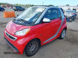 2013 Smart fortwo Passion z VIN WMEEK3BA5DK591221, wystawiony jako IAAI lot #42010853 z przebiegiem 101 953 mil mil oraz . Historia ofert i sprzedaży dostępna na DreamBid. Obrazek 17.
