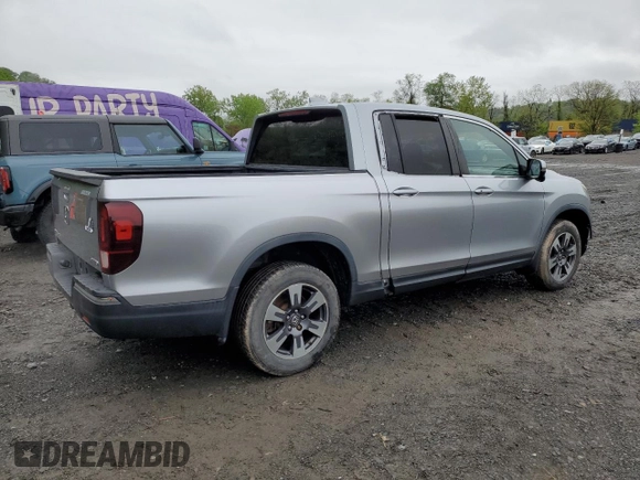 2018 Honda Ridgeline RTL-T z VIN 5FPYK3F65JB003934, wystawiony jako Copart lot #55588265 z przebiegiem 67 648 mil mil oraz Szkody całkowita. Historia ofert i sprzedaży dostępna na DreamBid. Obrazek 3.