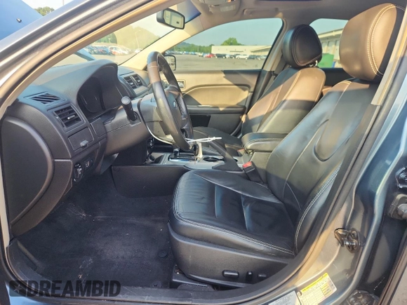 2012 Ford Fusion SEL with VIN 3FAHP0JA9CR294109, listed as a Copart auction lot 62759085 with 170,044 mi miles and Salvage title. Bid and sale history available at DreamBid. Image 7.