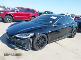 2021 Tesla Model S Long Range Plus with VIN 5YJSA1E28MF426080, listed as a IAAI auction lot 41979326 with 125,328 mi miles and . Bid and sale history available at DreamBid. Image 20.