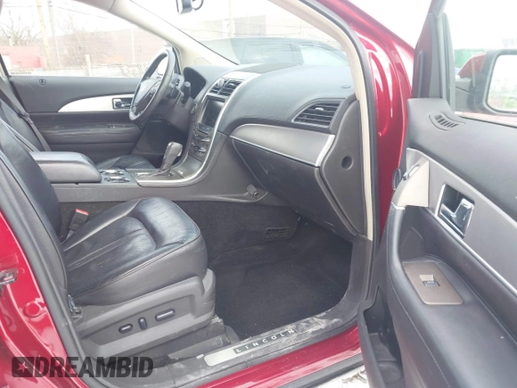 2014 Lincoln MKX with VIN 2LMDJ8JK2EBL06393, listed as a IAAI auction lot 41646903 with 118,394 mi miles. Bid and sale history available at carsss.com. Image 5.