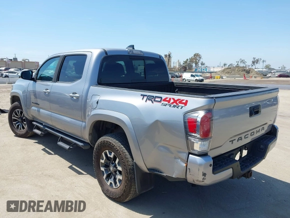 2021 Toyota Tacoma SR with VIN 3TMCZ5AN6MM393306, listed as a IAAI auction lot 42094095 with 57,217 mi miles and . Bid and sale history available at DreamBid. Image 3.
