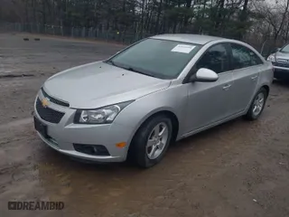2014 Chevrolet Cruze 1LT with VIN 1G1PC5SB1E7444562, listed as a IAAI auction lot 42019148 with 77,180 mi miles. Bid and sale history available at carsss.com. Image 2.