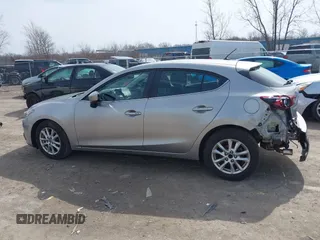 2015 Mazda 3 i Touring with VIN 3MZBM1L77FM138326, listed as a IAAI auction lot 41839685 with 97,506 mi miles and . Bid and sale history available at carsss.com. Image 14.