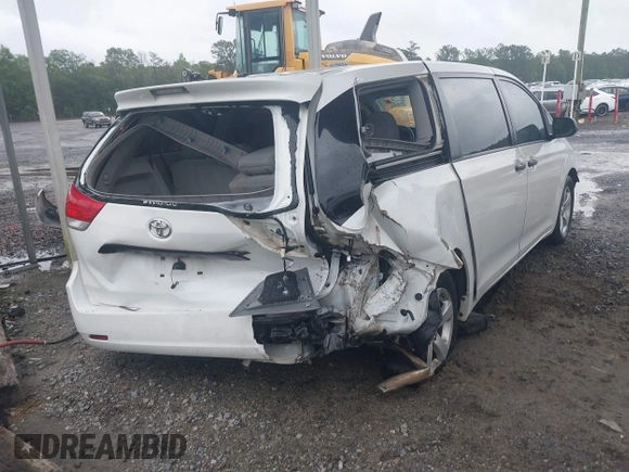 2014 Toyota Sienna L with VIN 5TDZK3DC9ES473780, listed as a IAAI auction lot 42245274 with 203,060 mi miles and . Bid and sale history available at DreamBid. Image 4.