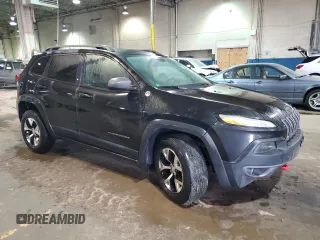2014 Jeep Cherokee Trailhawk with VIN 1C4PJMBS0EW111606, listed as a Copart auction lot 46680205 with 150,446 mi miles and Clean Title. Bid and sale history available at carsss.com. Image 4.