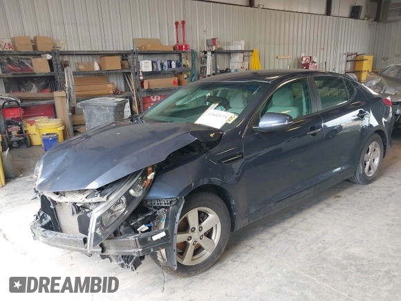 2015 Kia Optima LX z VIN 5XXGM4A77FG483662, wystawiony jako IAAI lot #42602173 z przebiegiem 81 971 mil mil oraz . Historia ofert i sprzedaży dostępna na DreamBid. Obrazek 2.