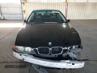 1999 BMW 5 Series 528iA with VIN WBADM6344XBY34517, listed as a Copart auction lot 51803145 with 186,637 mi miles and Salvage Title. Bid and sale history available at carsss.com. Image 5.