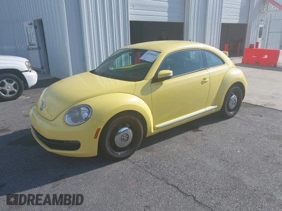2013 Volkswagen Beetle 2.5L with VIN 3VWHX7AT7DM613197, listed as a IAAI auction lot 41298890 with 130,219 mi miles and . Bid and sale history available at DreamBid. Image 2.
