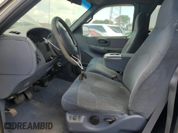 1999 Ford F-250 with VIN 1FTRX27LXXNC18863, listed as a Copart auction lot 63051395 with 118,695 mi miles and Clean title. Bid and sale history available at DreamBid. Image 7.