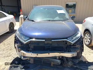 2020 Honda CR-V LX with VIN 2HKRW1H22LH412512, listed as a IAAI auction lot 42107381 with 60,062 mi miles and . Bid and sale history available at DreamBid. Image 13.