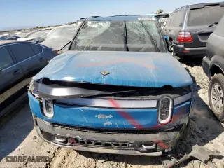 2022 Rivian R1T Adventure Package with VIN 7FCTGAAA4NN010881, listed as a Copart auction lot 58783584 with 0 mi miles and Salvage Title. Bid and sale history available at carsss.com. Image 5.