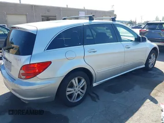 2007 Mercedes-Benz R 5.0L with VIN 4JGCB75E07A039014, listed as a IAAI auction lot 42153844 with 110,743 mi miles. Bid and sale history available at carsss.com. Image 4.