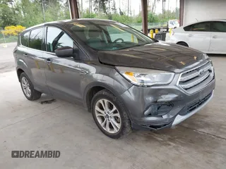 2017 Ford Escape SE z VIN 1FMCU9G93HUC97081, wystawiony jako IAAI lot #42327866 z przebiegiem 97 580 mil mil oraz . Historia ofert i sprzedaży dostępna na DreamBid. Obrazek 1.