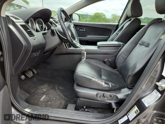 2015 Mazda CX-9 Touring with VIN JM3TB2CA1F0451039, listed as a Copart auction lot 61267635 with 173,967 mi miles and Clean title. Bid and sale history available at DreamBid. Image 7.