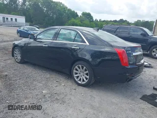 2016 Cadillac CTS RWD with VIN 1G6AP5SX0G0118831, listed as a IAAI auction lot 42105091 with 123,507 mi miles and . Bid and sale history available at DreamBid. Image 3.
