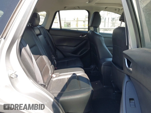 2014 Mazda CX-5 Grand Touring with VIN JM3KE2DY0E0331942, listed as a IAAI auction lot 41750533 with 163,387 mi miles. Bid and sale history available at carsss.com. Image 8.