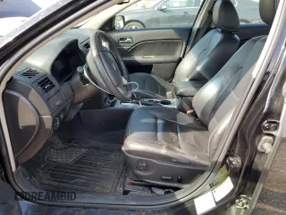 2010 Ford Fusion Hybrid с VIN 3FADP0L32AR310256, выставлен на аукционе Copart как лот 54310965 с пробегом 126 258 миль миль и Списание • Salvage title. История ставок и продаж доступна на DreamBid. Изображение 7.