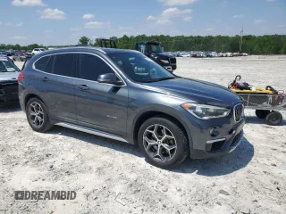 2017 BMW X1 sDrive28i with VIN WBXHU7C32HP925374, listed as a Copart auction lot 54820225 with 136,708 mi miles and Clean Title. Bid and sale history available at carsss.com. Image 4.