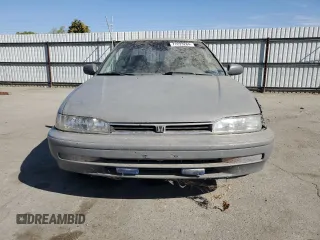 1992 Honda Accord z VIN 1HGCB7254NA015113, wystawiony jako Copart lot #77223284 z przebiegiem 219 007 mil mil oraz Szkoda całkowita • Salvage title. Historia ofert i sprzedaży dostępna na DreamBid. Obrazek 5.