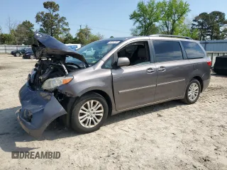 2015 Toyota Sienna XLE with VIN 5TDYK3DC5FS588518, listed as a Copart auction lot 52234795 with 231,980 mi miles and Clean title. Bid and sale history available at DreamBid. Image 1.