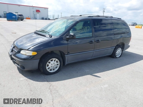 1999 Dodge Grand Caravan with VIN 1B4GP54GXXB897614, listed as a IAAI auction lot 42141997 with 157,698 mi miles and . Bid and sale history available at DreamBid. Image 2.